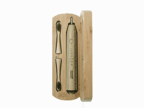 a upright view of a bamboo electric toothbrush case which has a bamboo electric toothbrush and tooth brush head instilled in the eco friendly case